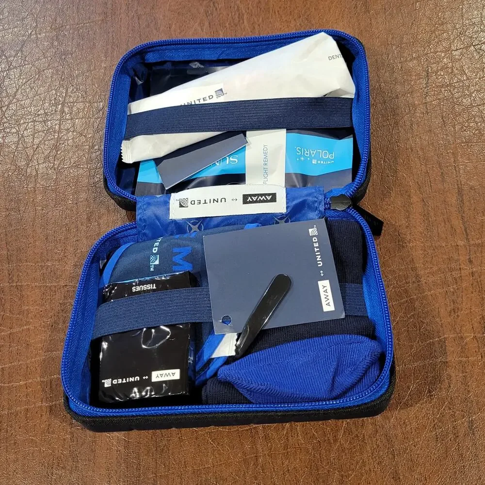New AWAY Travel The Mini Suitcase Toiletry Case United Polaris Amenity Kit Pouch